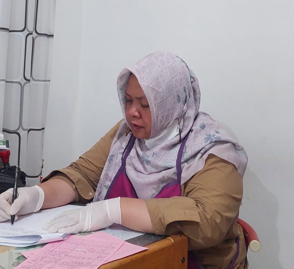 Drg. Riza Andini